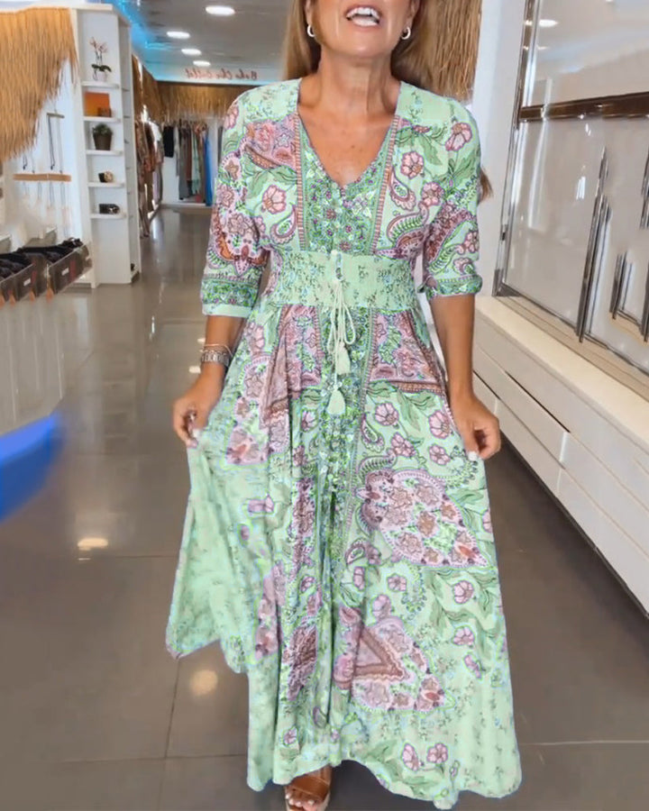 Vestido maxi elegante y cómodo con estampado bohemio y cintura ajustable, para cualquier ocasión.