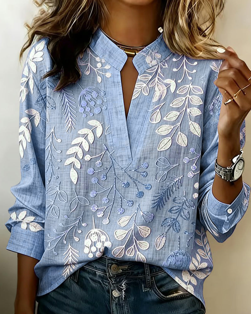 Ropa femenina: blusa floral elegante de corte regular. Estilo versátil para ocasiones casuales y de verano.