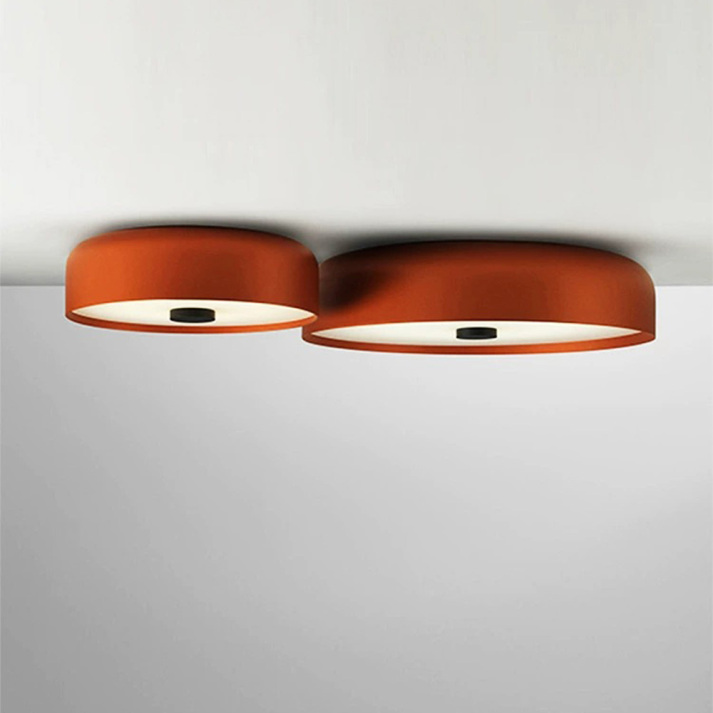 Luminaria LED de techo redonda, minimalista y regulable, ideal para decoración interior del hogar.