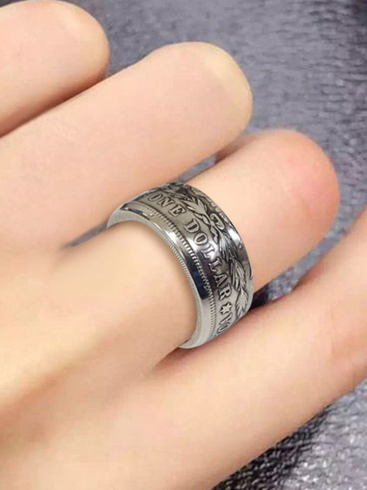 Anillo vintage platinado de moneda Morgan con águila, joyería de estilo único y exclusivo para regalo.