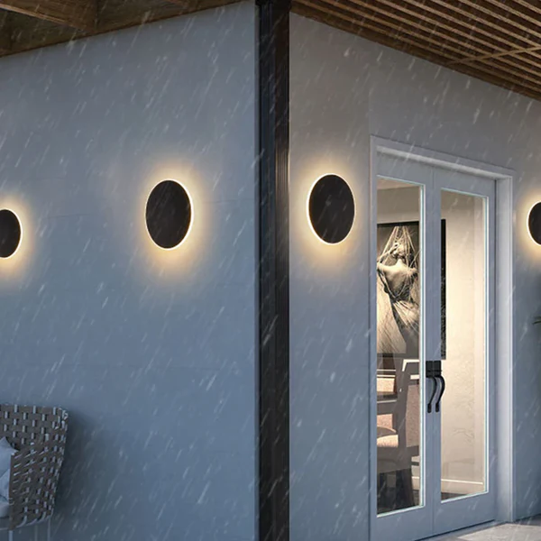 Lámpara de pared LED para exterior, diseño redondo. Perfecta para entradas y patios.