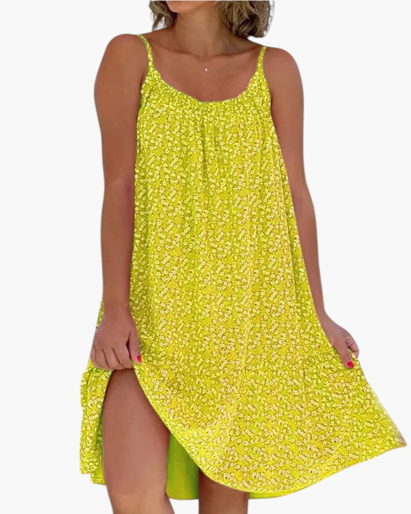 Vestido de verano estampado para mujer. Con tirantes, ligero y fluido. Ideal para un look casual o playa.