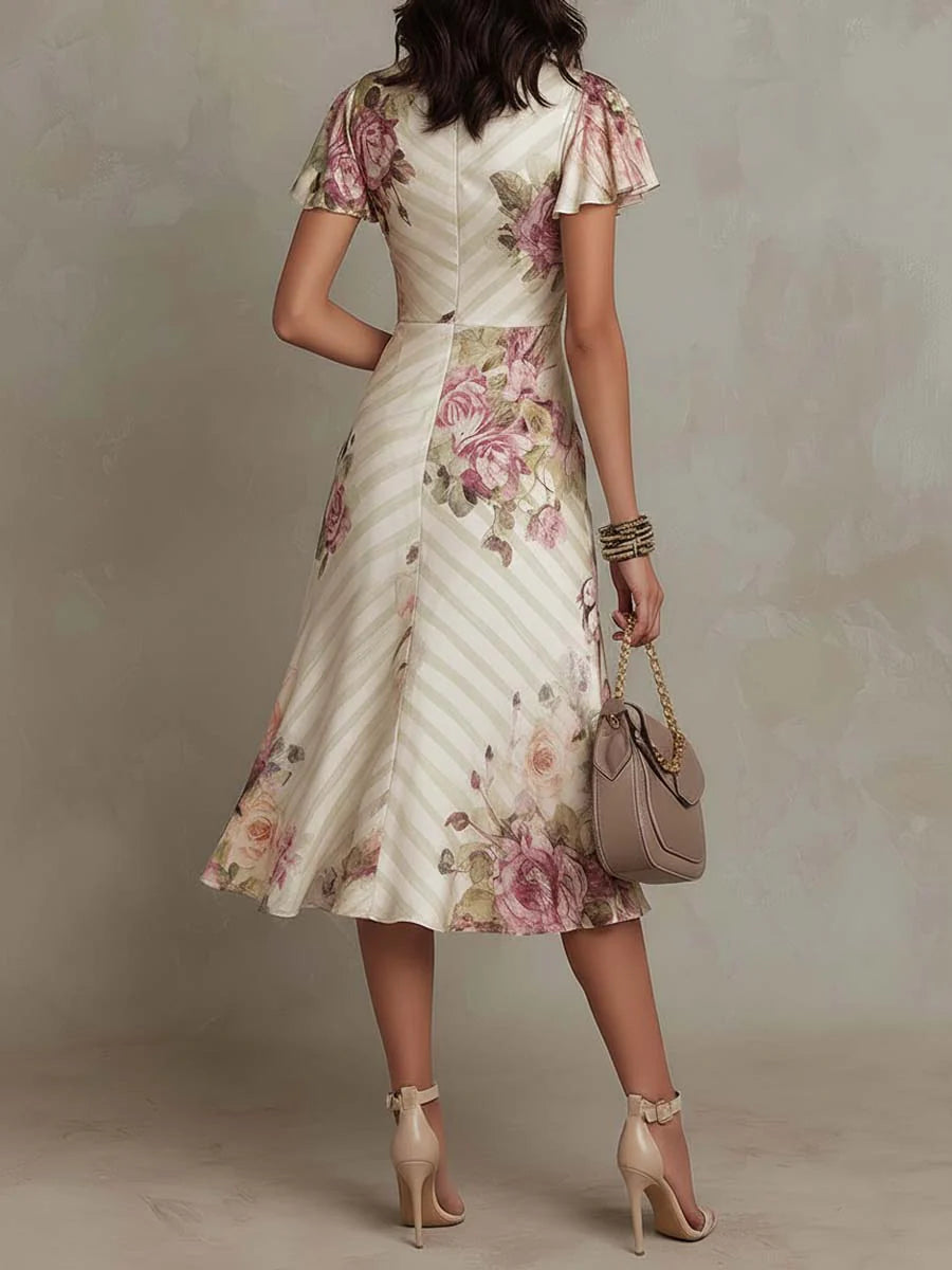 Vestido midi floral estampado para mujer. Ideal para moda primavera-verano, vacaciones y estilo femenino.