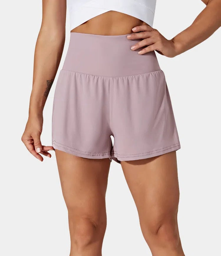 Short de running para mujer, cintura alta, bolsillos seguros, máxima comodidad.