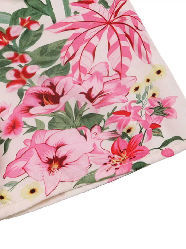 Vestido midi floral fucsia con patrón vibrante y cuello en V. Moda de mujer para primavera/verano.