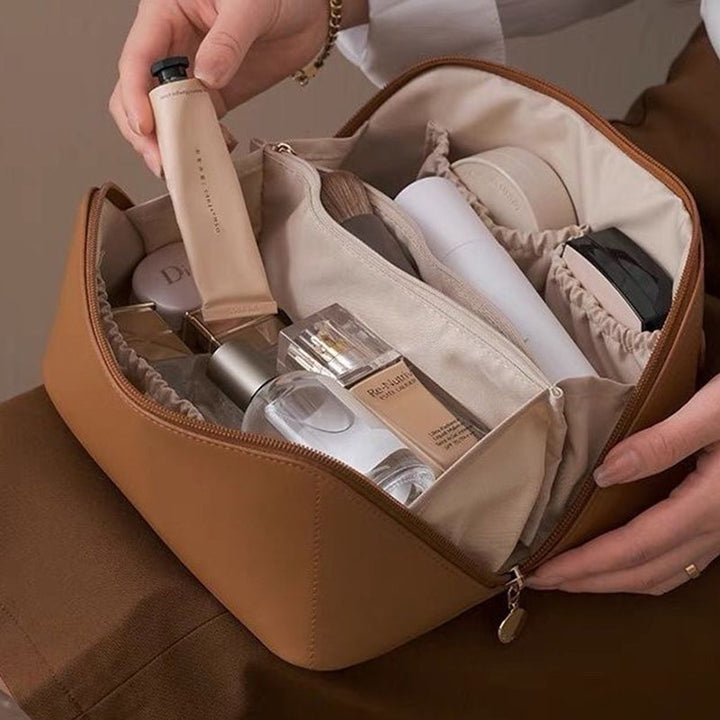 Neceser de viaje espacioso para cosméticos de mujer. Organizador de maquillaje PU ideal para viajes.