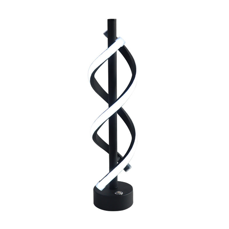Renueva tu espacio con esta lámpara de mesa LED espiral. Diseño nórdico moderno que aporta ambiente.