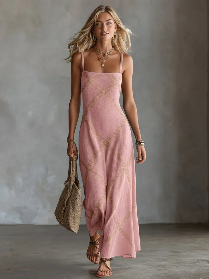Vestido de mujer fresco con estampado geométrico y tirantes. Perfecto para look casual, vacaciones o moda de verano.