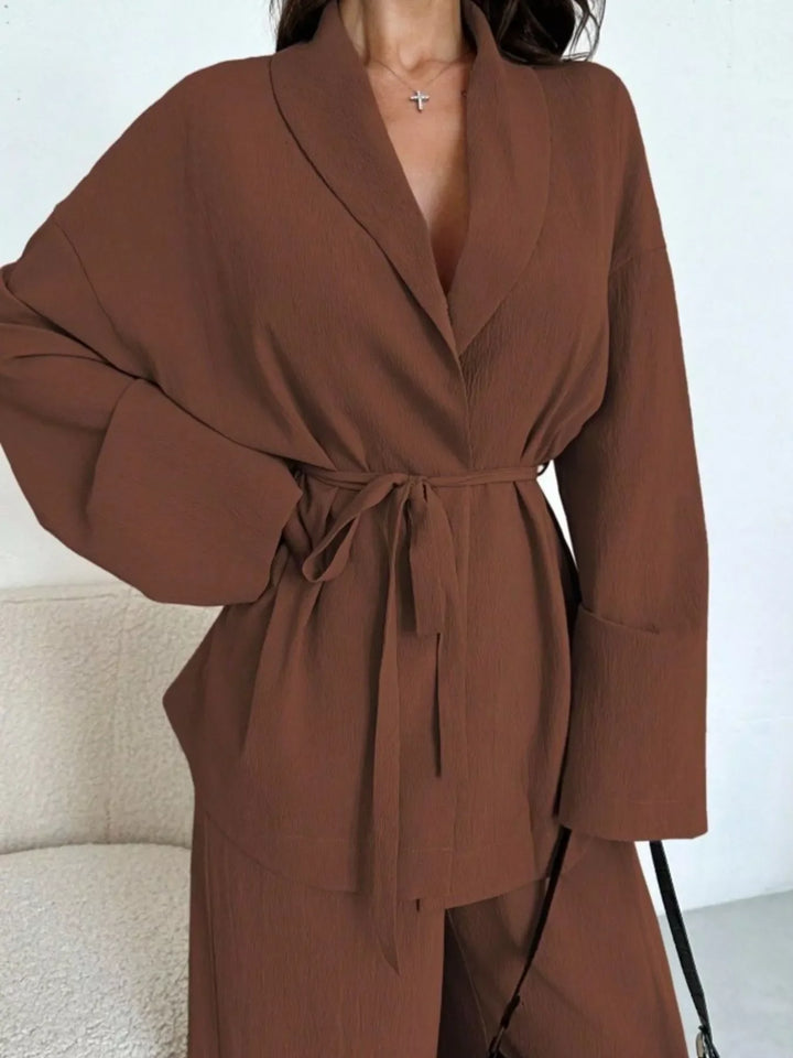 Conjunto mujer oficina: Top con lazo, pantalón ancho. Estilo profesional y chic.