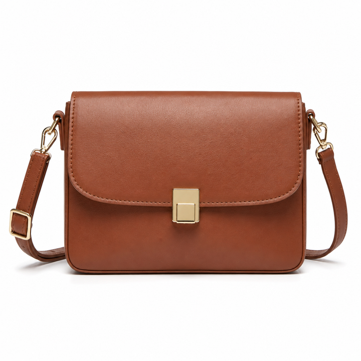 Bolso bandolera elegante de mujer. Cuero sintético marrón, diseño moderno y versátil para moda.