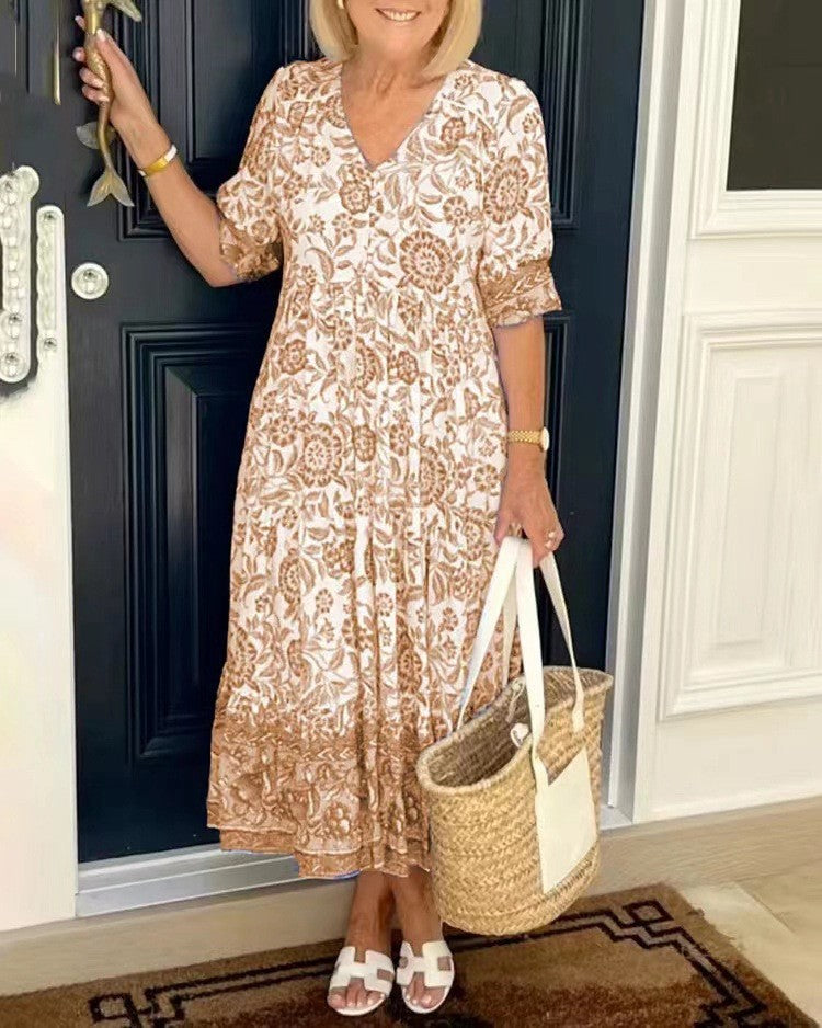 Vestido floral de mujer con escote V, fluido y transpirable. Ligero para verano, estilo casual y elegante en rosa.