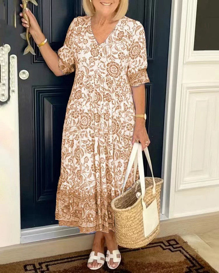 Vestido floral de mujer con escote V, fluido y transpirable. Ligero para verano, estilo casual y elegante en rosa.