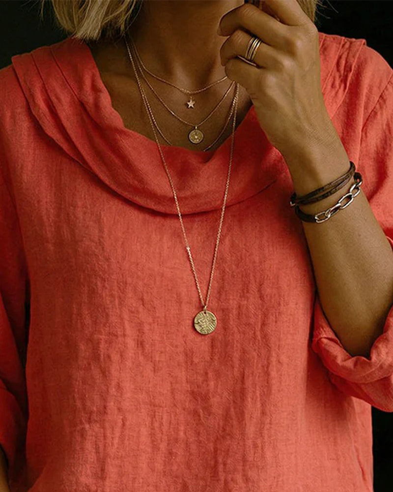 Moda femenina: camisa cómoda de mujer con cuello caído, prenda versátil para un look relajado.