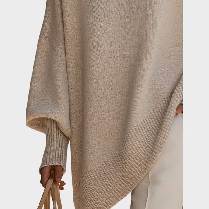 Poncho asimétrico de punto para mujer, estilo oversize. Comodidad y moda.