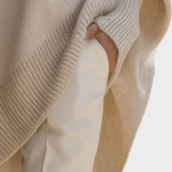 Capa de punto mujer, talla grande, con diseño asimétrico y corte oversize.
