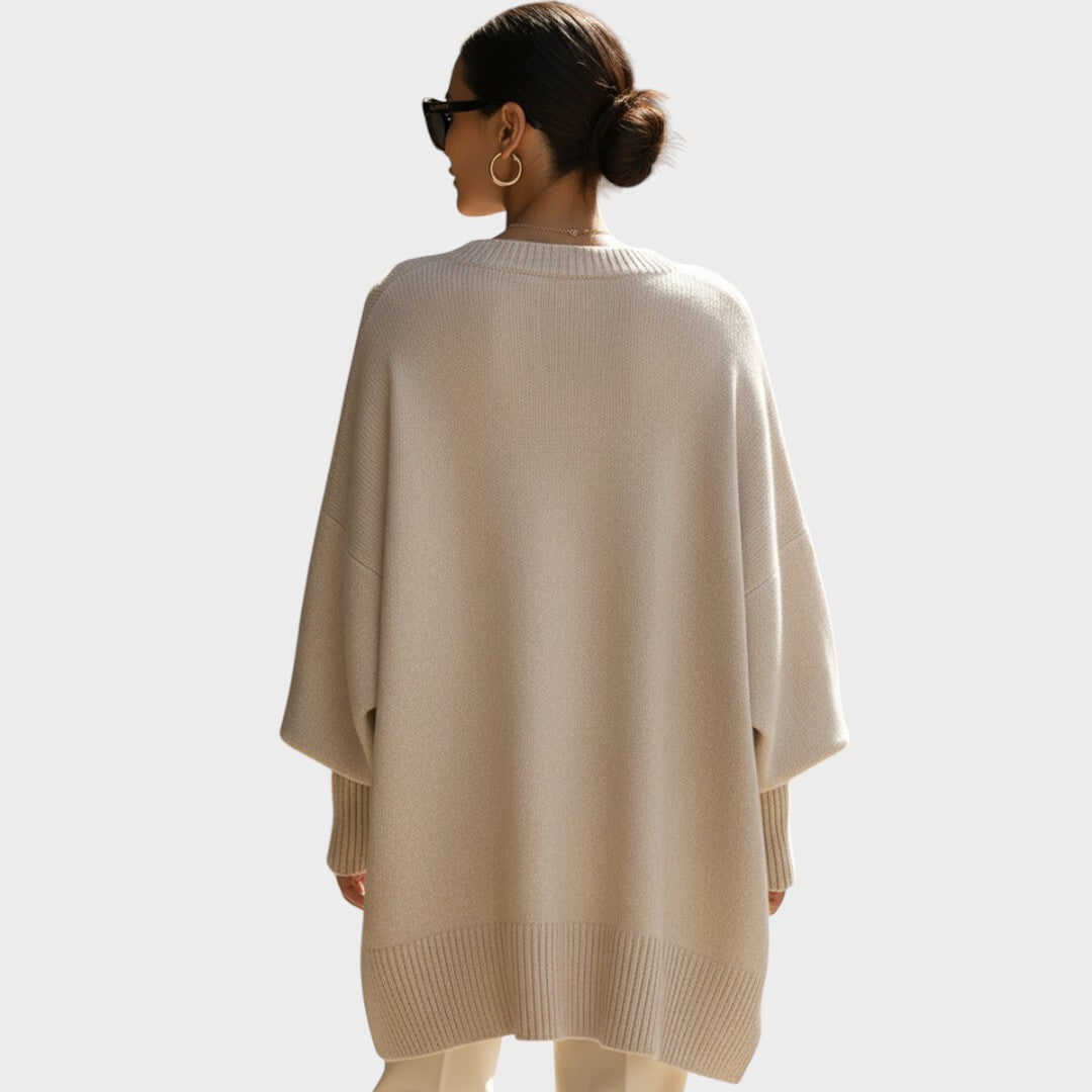 Moda otoño invierno: Capa de punto oversize asimétrica para mujer.