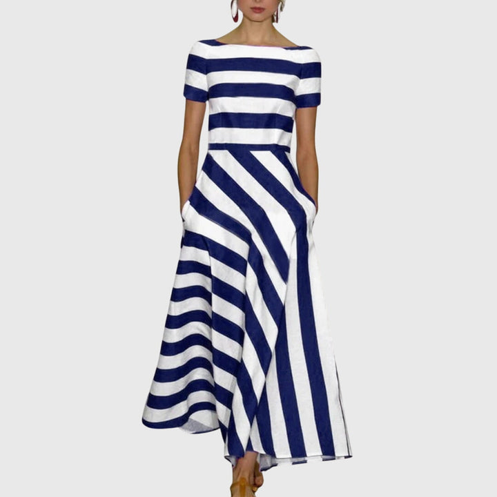 Vestido maxi a rayas para mujer, diseño fluido y elegante. Cómodo y versátil para eventos de verano o look casual de moda.