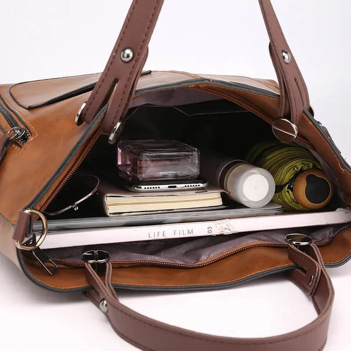Bolso bandolera vintage marrón de cuero sintético para mujer, estilo clásico diario.