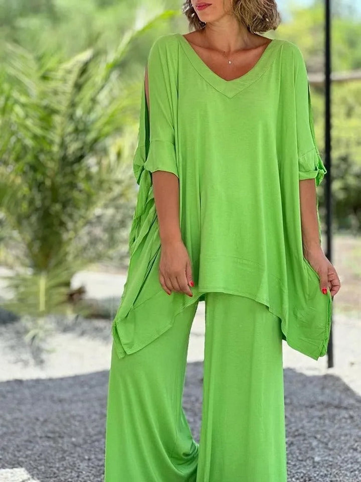Conjunto de moda mujer: dos piezas con blusa holgada y pantalón ancho. Casual chic, cómodo para cualquier ocasión.
