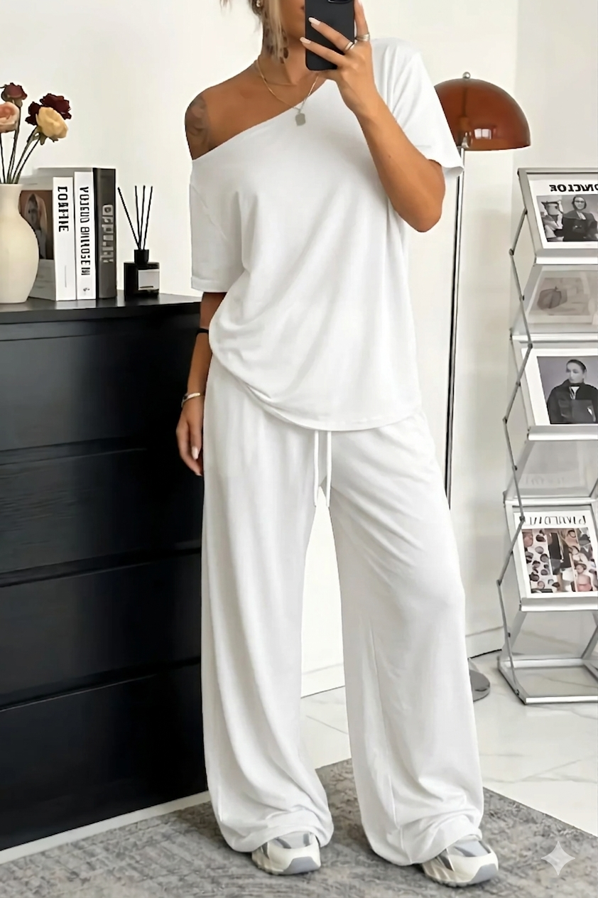 Conjunto de mujer de dos piezas: top moderno hombro descubierto y pantalón amplio casual. Ropa cómoda para primavera.
