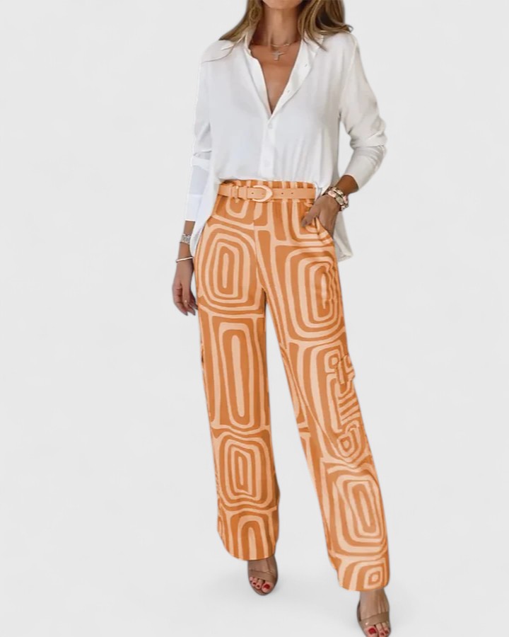 Conjunto elegante dos piezas mujer con cinturón. Estilo moderno, estampado geométrico. Versátil para casual/formal.
