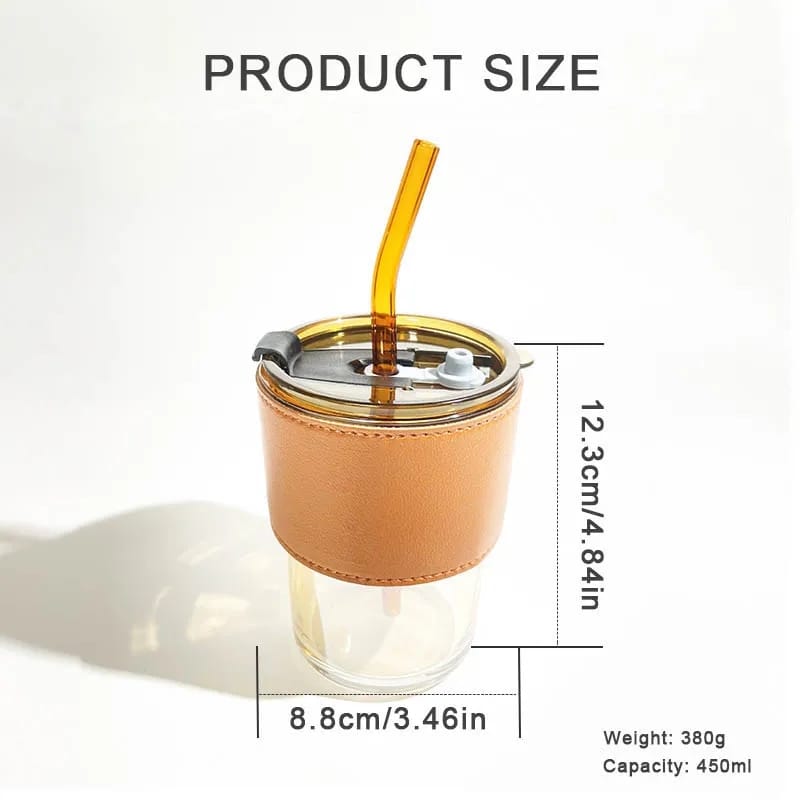Detalle de vaso de vidrio resistente para café, con tapa de silicona y pajita reutilizable, 450 ml.