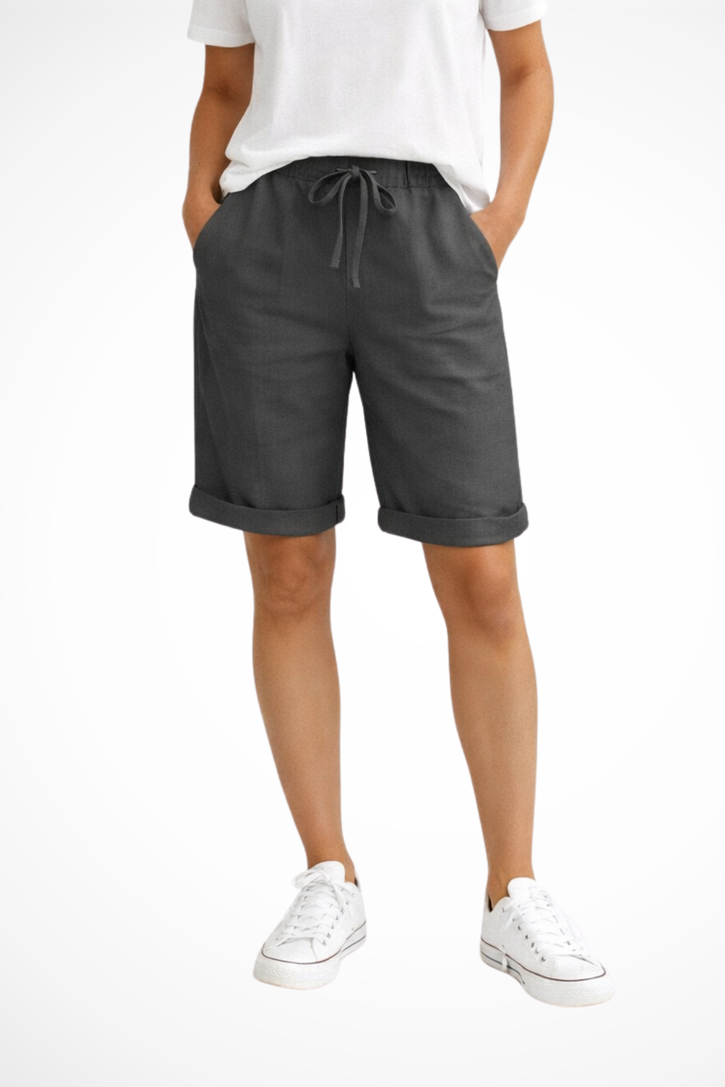 Detalle del tejido de lino en pantalón capri para mujer, transpirable y fresco para el calor del verano.