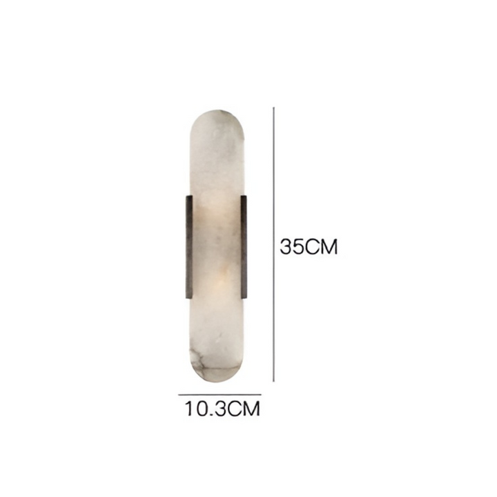 Foco direccional LED en aplique de mármol y metal, ideal como luz de acento en dormitorios.