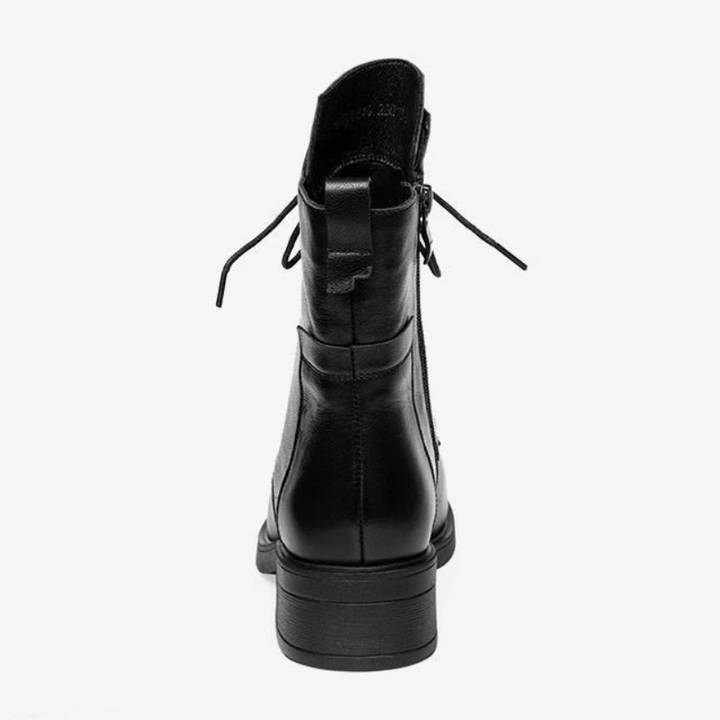 Botines de mujer negros, con punta afilada y diseño elegante. Calzado cómodo y de moda para el tobillo.