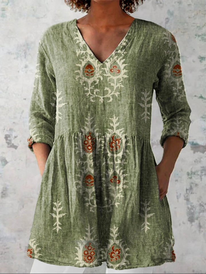 Camisa larga vintage de cuello V para mujer, fluida, estampado elegante, ideal verano casual.