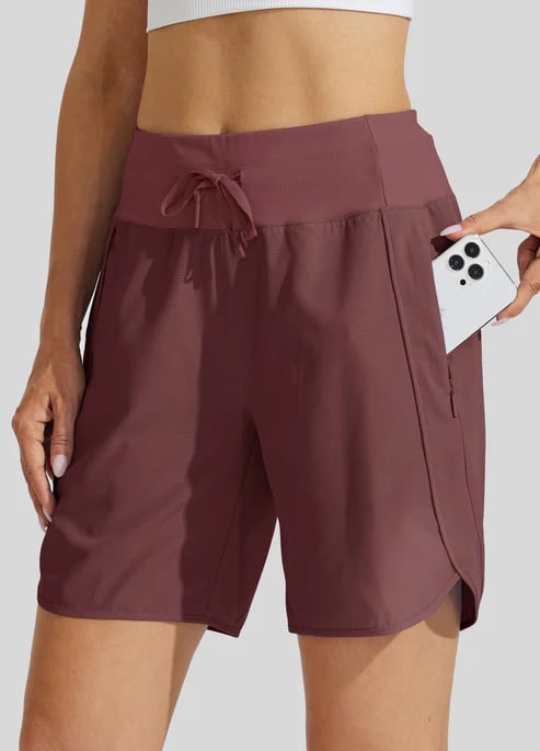 Short deportivo mujer, cintura alta, cordón ajustable, bolsillos. Perfecto para actividades casuales.