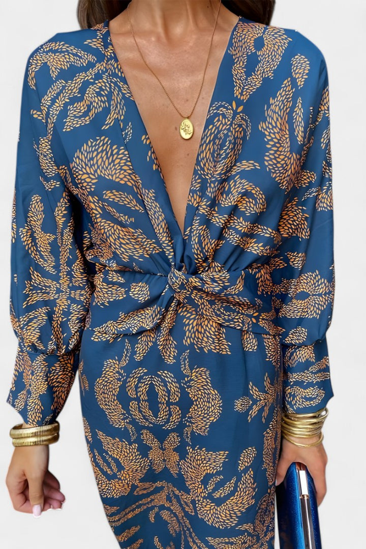 Vestido largo Elara con nudo frontal, escote V. Ropa femenina de estilo moderno, ideal para fiestas y celebraciones.