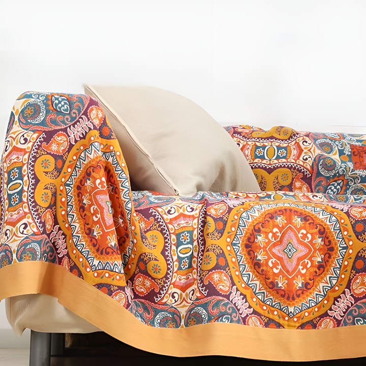 Manta boho de algodón reversible, refrescante. Perfecta para dormir en verano, ofrece confort y estilo al dormitorio.