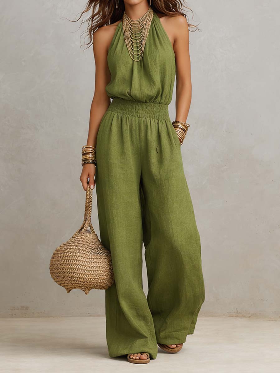 Mono de mujer con cuello halter, espalda descubierta y diseño de pierna ancha. Fresco y chic para el verano.