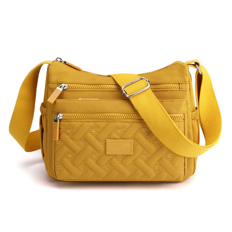 Bolso hombro mujer elegante, accesorio imprescindible para moda femenina y entornos de oficina.