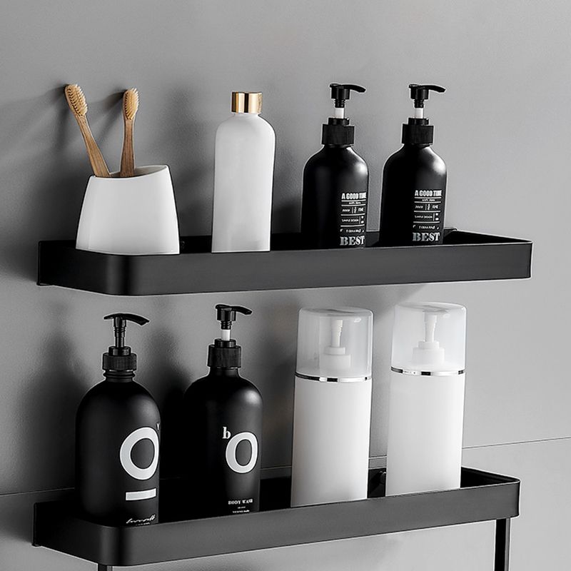 Organizador de pared para baño en acero inoxidable negro mate, estilo moderno.