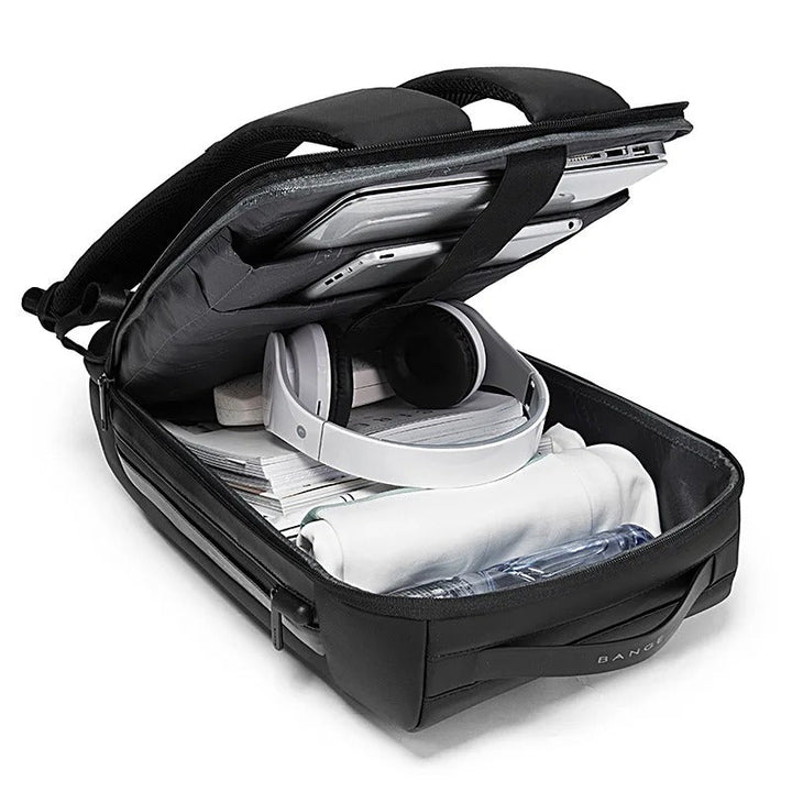 Mochila de seguridad impermeable para portátil 15.6", diseño antirrobo que protege tu ordenador en cualquier viaje.