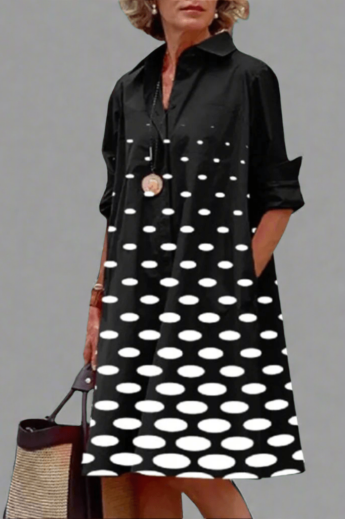 Vestido midi fluido negro para mujer, elegante y versátil. Perfecto para ocasiones casuales o formales, moda atemporal.