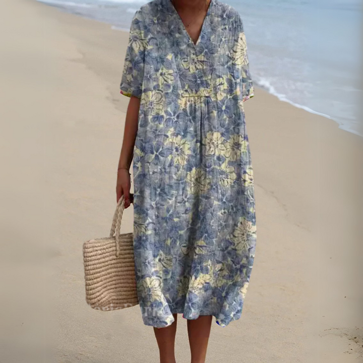 Vestido floral transpirable para mujer, estampado elegante, ideal para el calor de verano.