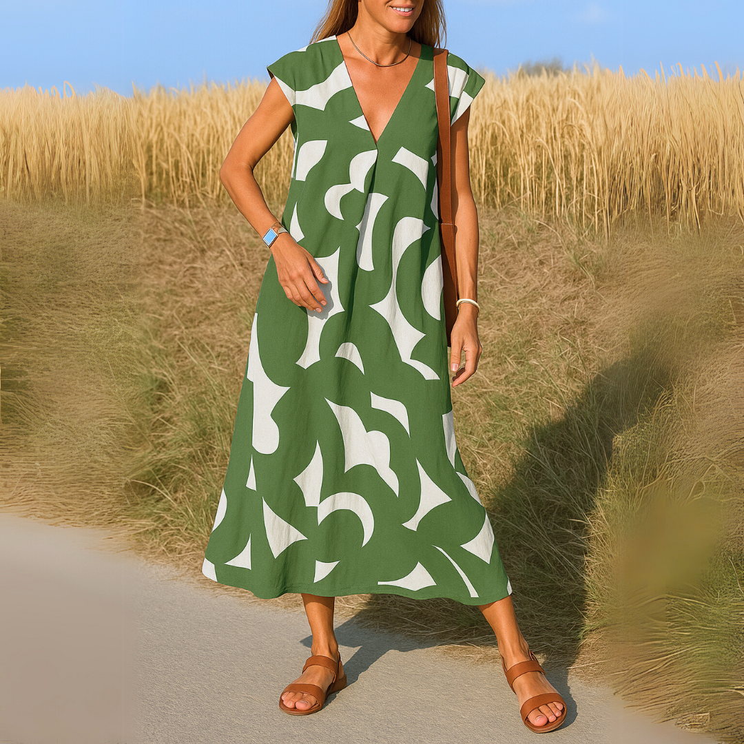 Vestido elegante de verano para mujer, con escote en V. Diseño fluido, perfecto para fiesta o look casual chic.