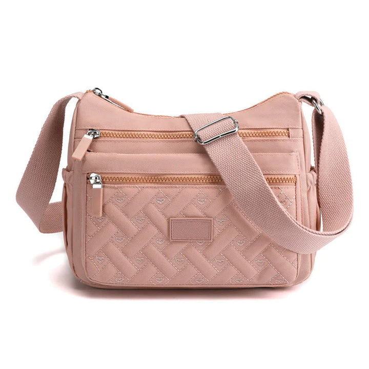 Bolso clásico y versátil para mujer, un toque de elegancia esencial en tu moda femenina.