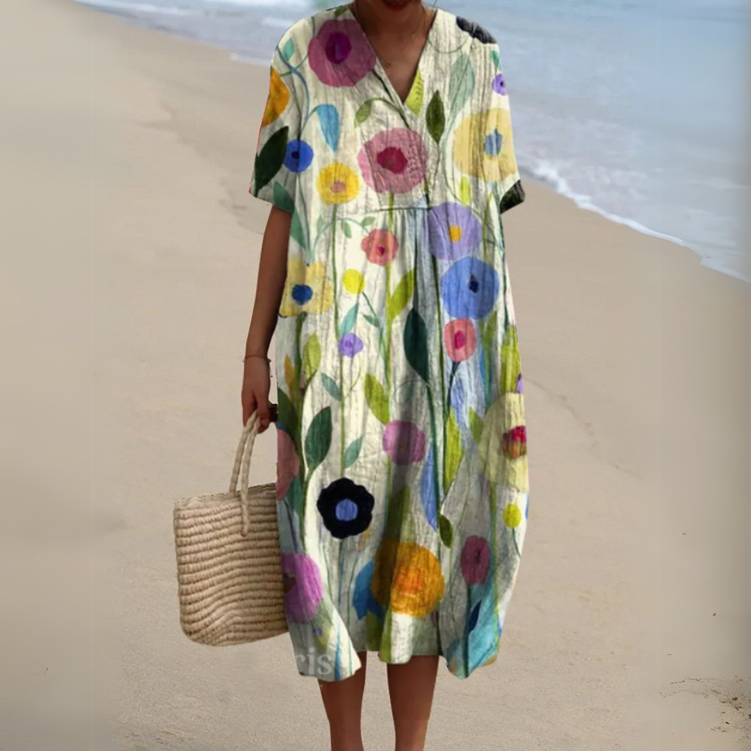 Vestido floral con estampado vibrante para mujer, ideal para ocasiones de primavera y verano.
