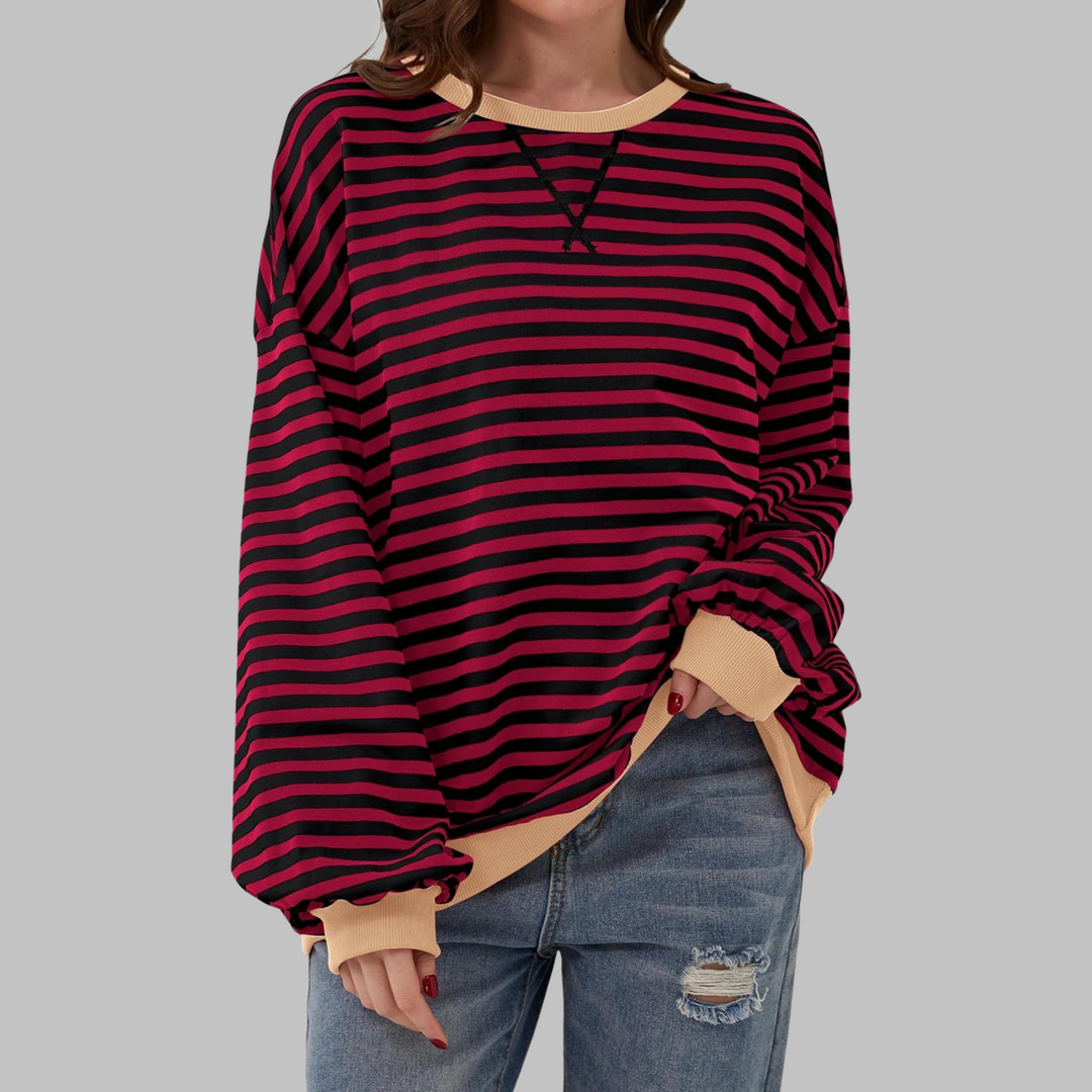 Look diario: sudadera a rayas de mujer, prenda esencial para tu armario.