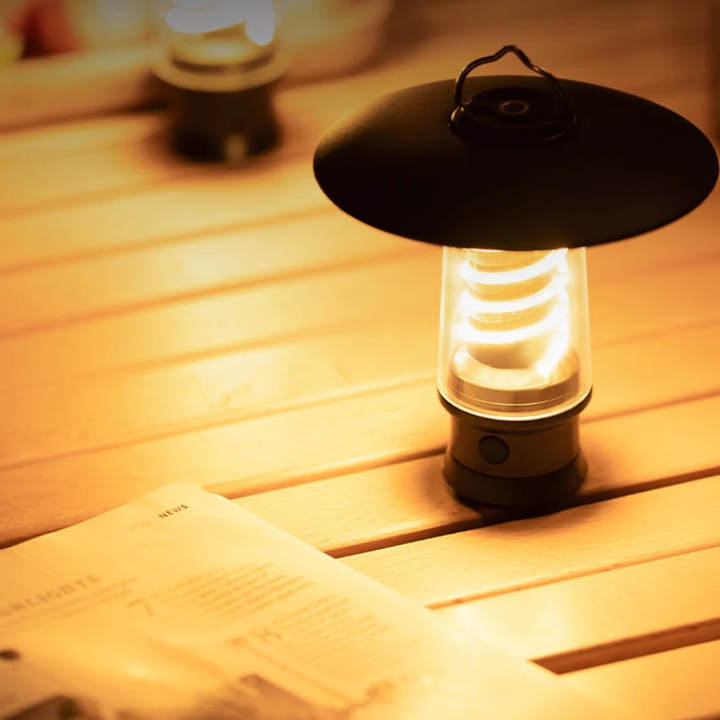 Lámpara USB de exterior con luz cálida, ideal para acampar, decorar y crear atmósfera.