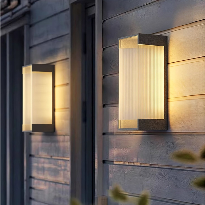 Iluminación exterior LED regulable de diseño moderno, aplique de acero inoxidable.