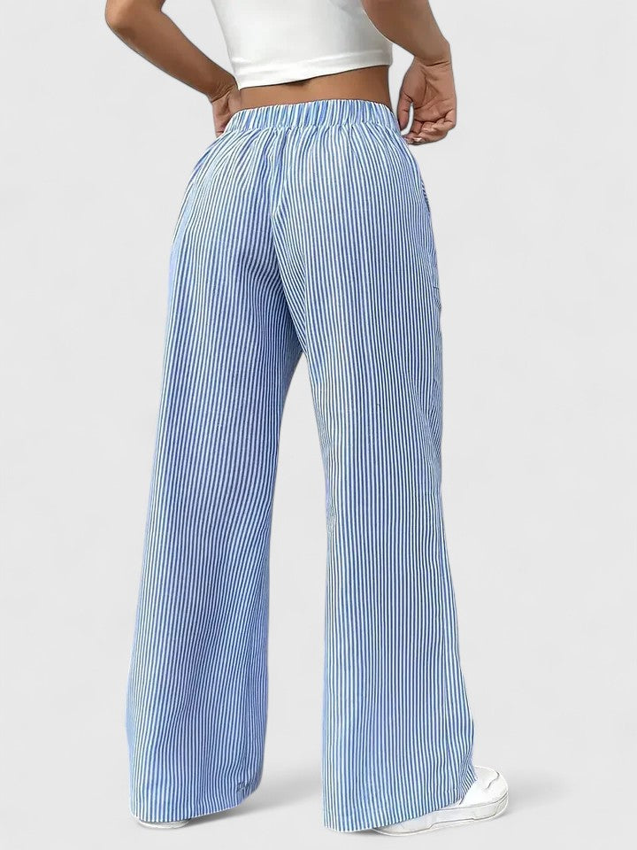 Pantalón amarillo mostaza, pierna ancha, cintura ajustable. Ropa femenina cómoda y chic.