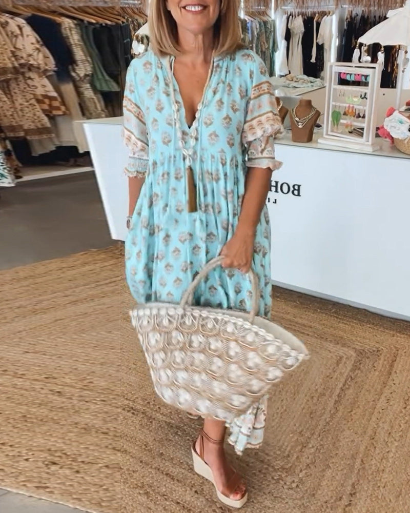 Vestido bohemio maxi de capas para mujer, escote V. Ideal para verano, look casual chic y fluido.