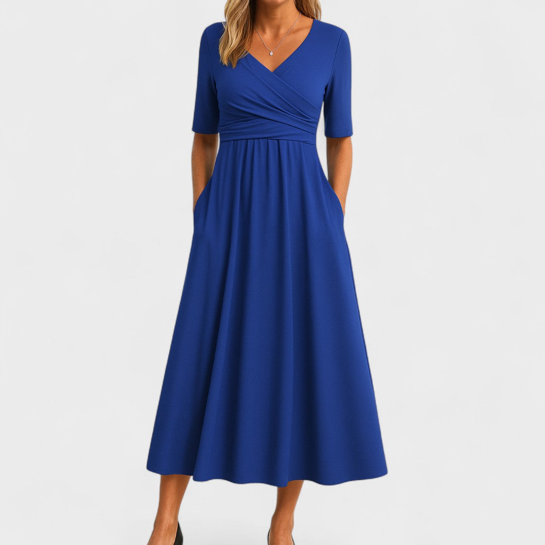 Vestido midi elegante para invitada de boda. Estilo sofisticado y femenino, disponible en varios colores y tallas.