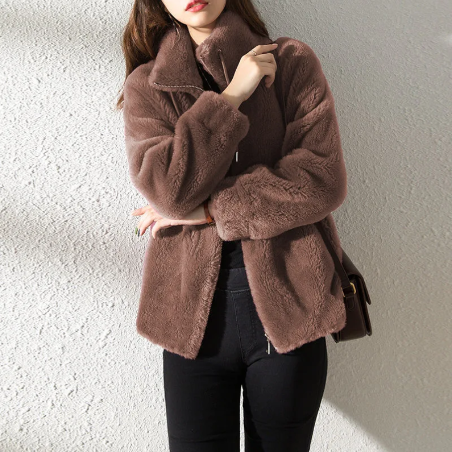 Abrigo de otoño oversized para mujer, de ante, con un diseño chic y atemporal de alta calidad.