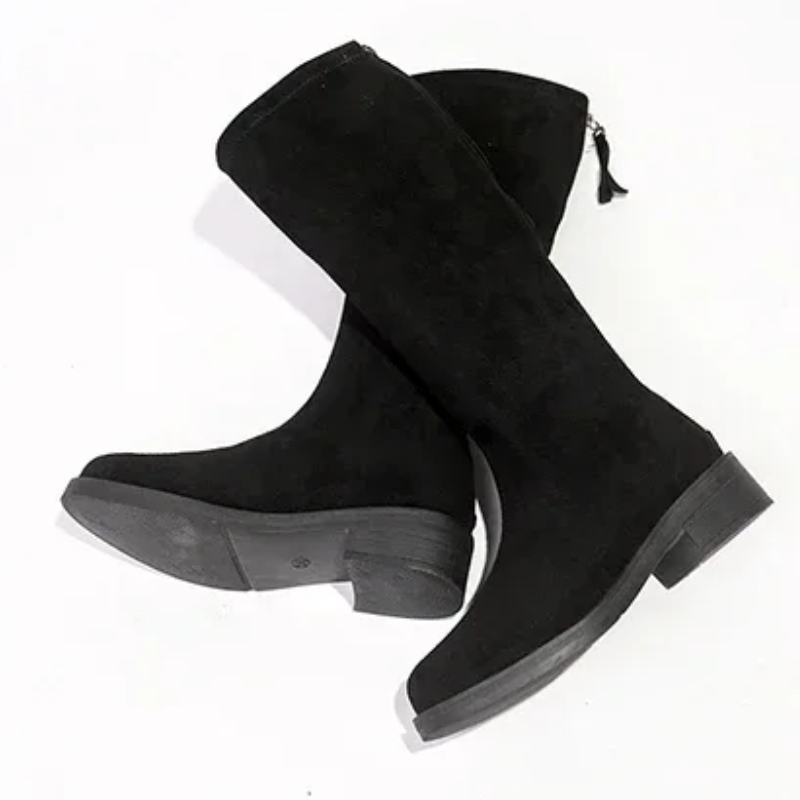 Botas de invierno negras para mujer, altas, ligeras y de estilo minimalista.